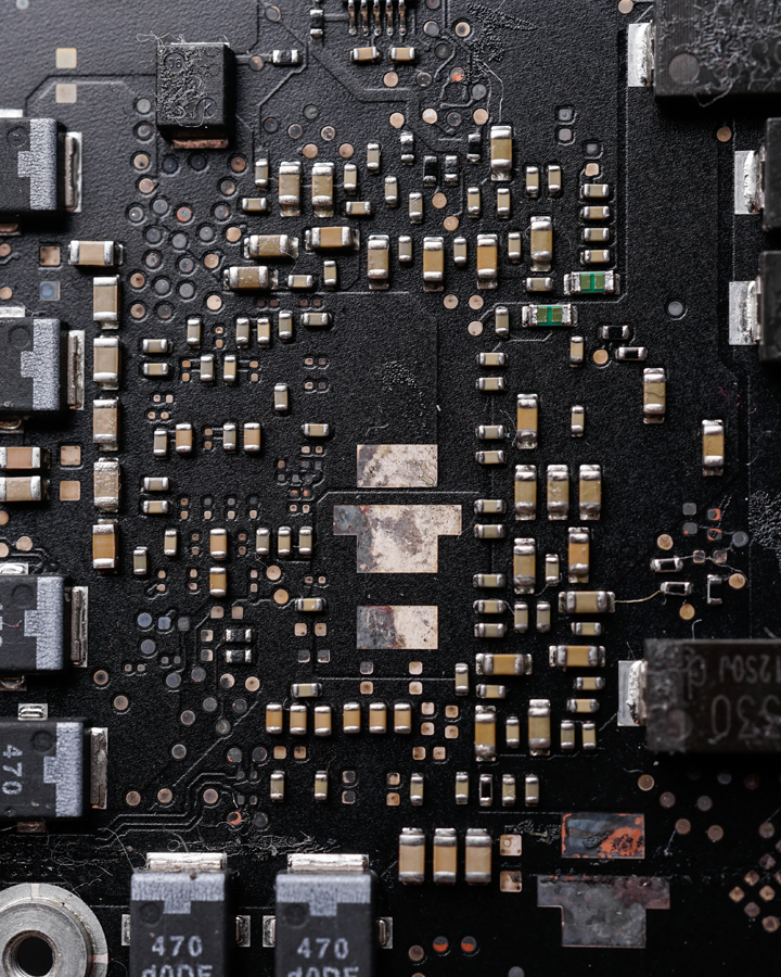 A computer motherboard, showing various electronic components and circuitry.