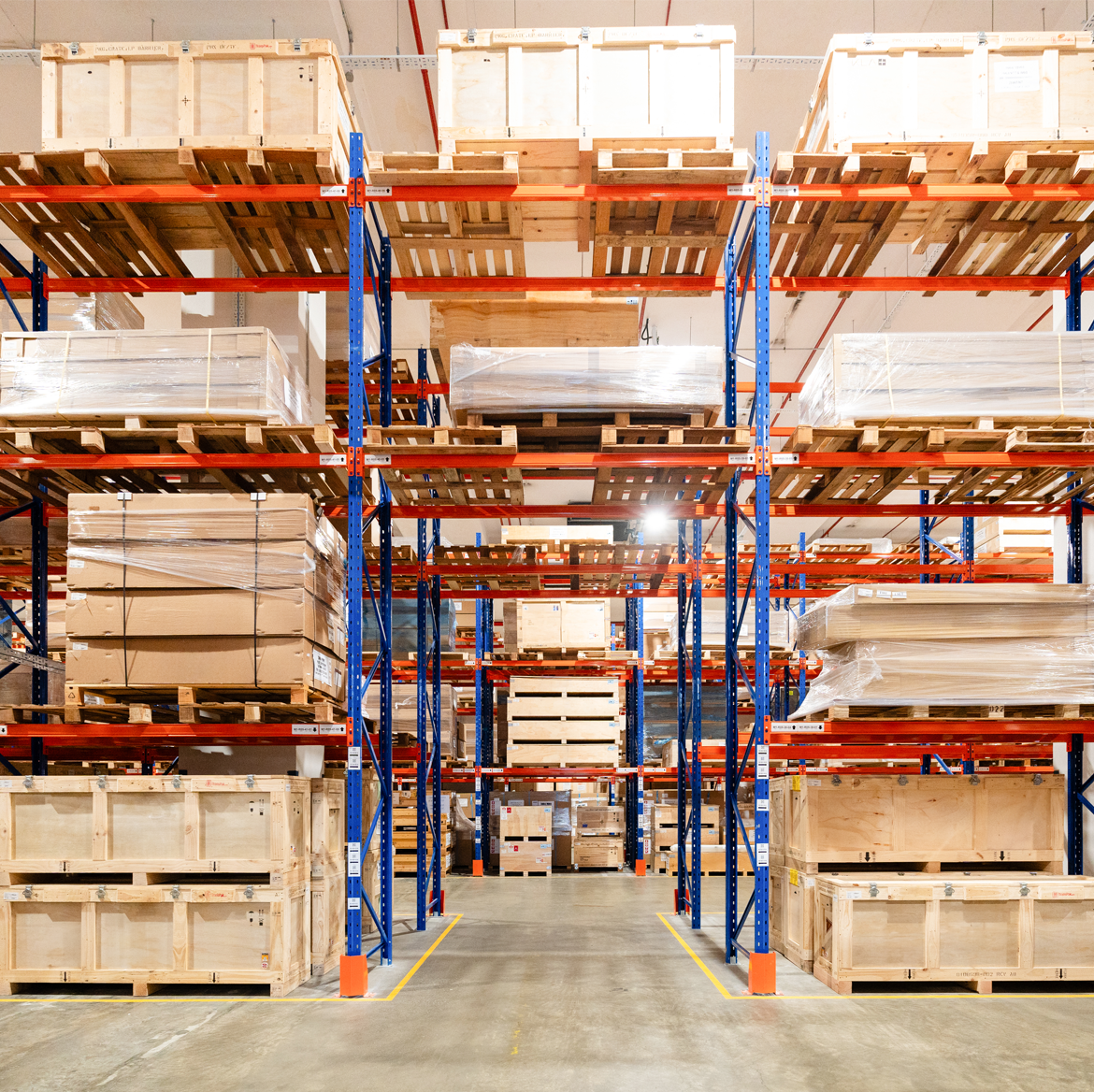 A Morrison warehouse filled with cargo on pallets for storage management.