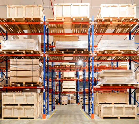 A Morrison warehouse filled with cargo on pallets for storage management.